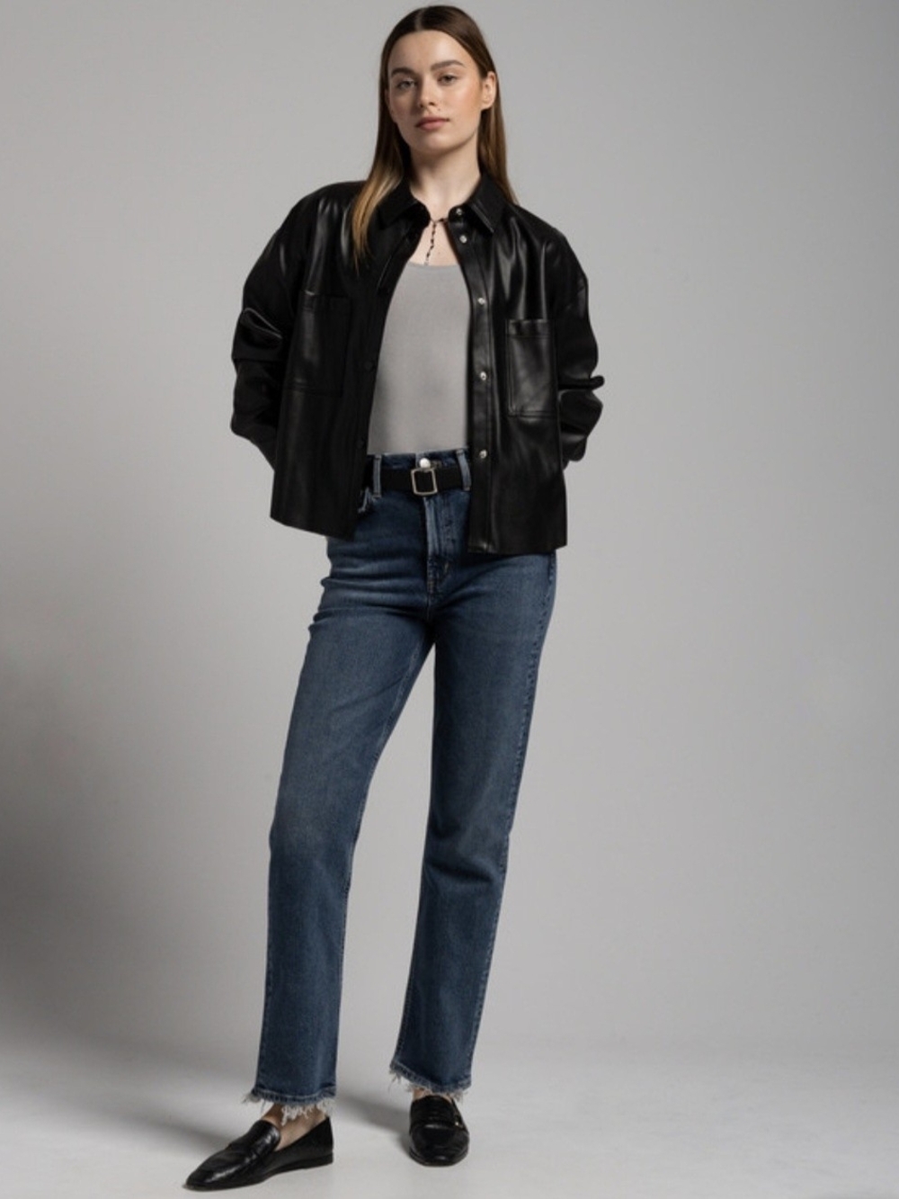 Blue Jeans With A Distressed Effect